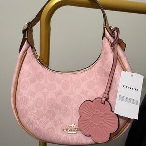 Coach Powder Pink Emily Shoulder Bag In Signature Canvas With Charms